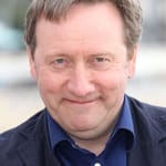 นีล ดัดเจียน (Neil Dudgeon)