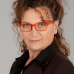 โดรา โรมาโน่ (Dora Romano)