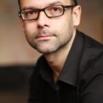 กิลเบิร์ต ไทรนา (Gilbert Traïna)