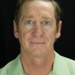 จอห์น บรัมป์ตัน (John Brumpton)