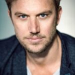 อดัม เดมอส (Adam Demos)