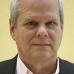 คริส เอลลิส (Chris Ellis)