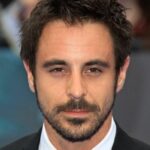 เอ็มมูน เอลเลียต (Emun Elliott)