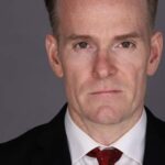 จิม อี. แชนด์เลอร์ (Jim E. Chandler)