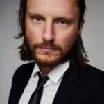 โจชัว มิเกล (Joshua Mikel)