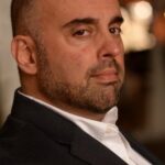 ไมเคิล คาปริโอลี (Michael Caprioli)