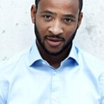 โรเมน เวท (Romaine Waite)