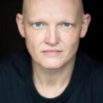 โรว์แลนด์ โฮล์มส์ (Rowland Holmes)