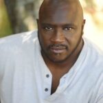 ไบรอัน 'วูล์ฟแมน แบล็ก' โบว์แมน (Brian 'Wolfman Black' Bowman)