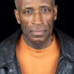 จอห์น อี. บราวน์ลี (John E. Brownlee)