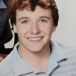 จอห์น พี. นาวิน จูเนียร์ (John P. Navin, Jr.)