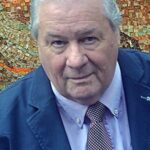 บรูซ แม็คไกวร์ (Bruce McGuire)