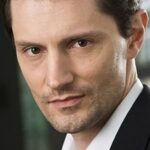 จอห์น เอ็มเม็ต เทรซี่ (John Emmet Tracy)