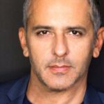 คล็อด โนลตัน (Claude Knowlton)