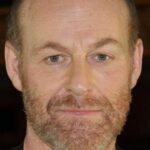 สติก อาร์. อัมดัม (Stig R. Amdam)